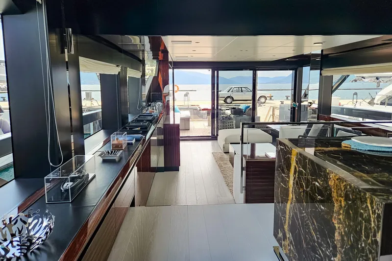 4990 Yacht Photos Pics Luxurious interior of 2024 Riva 82' Diva yacht with modern design and scenic views.