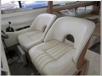 My Girls Too Yacht Photos Pics Interior of 1998 Viking Princess 460 Sport Cruiser Flybridge with white leather seats.