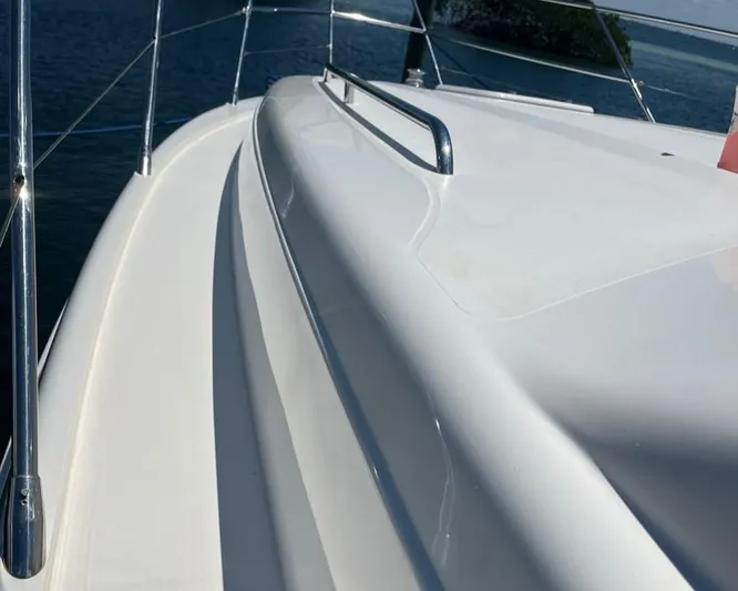 My Girls Too Yacht Photos Pics 1998 Viking Princess 460 Sport Cruiser Flybridge deck with railing, ocean view.