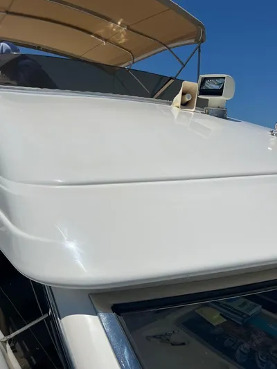 My Girls Too Yacht Photos Pics 1998 Viking Princess 460 Sport Cruiser Flybridge, sleek design, white exterior, sunny day.