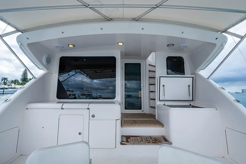  Yacht Photos Pics 2006 Bertram 630 Convertible yacht interior with sleek design and modern amenities.