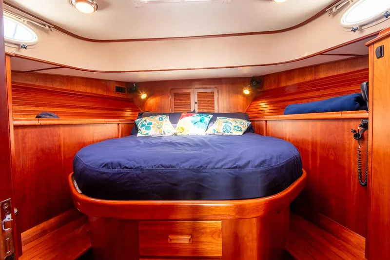 Chic Yacht Photos Pics Luxurious cabin interior of 2003 Hinckley Talaria 44 Express yacht with wooden finish.