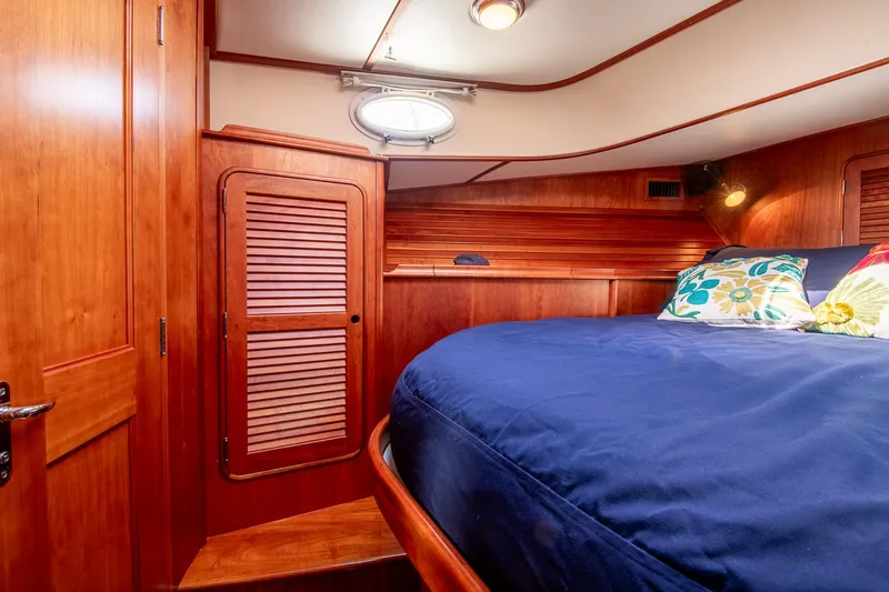 Chic Yacht Photos Pics Luxurious cabin interior of 2003 Hinckley Talaria 44 Express yacht with wooden finish.