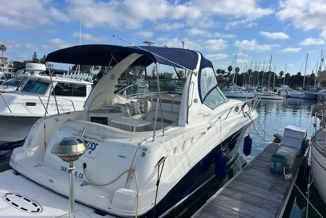 H20 Kiss Yacht Photos Pics 2005 Searay 320 yacht docked at marina under blue sky.