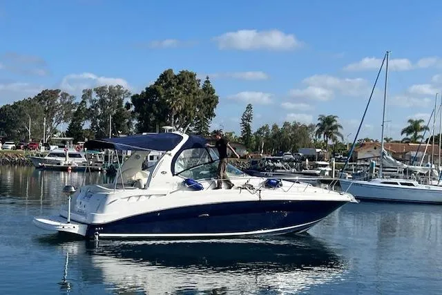 H20 Kiss Yacht Photos Pics 2005 Searay 320 boat docked in a marina under a clear blue sky.