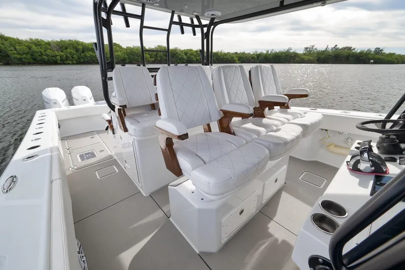  Yacht Photos Pics Luxurious 2022 Freeman 42LR boat interior with plush seating and scenic water view.