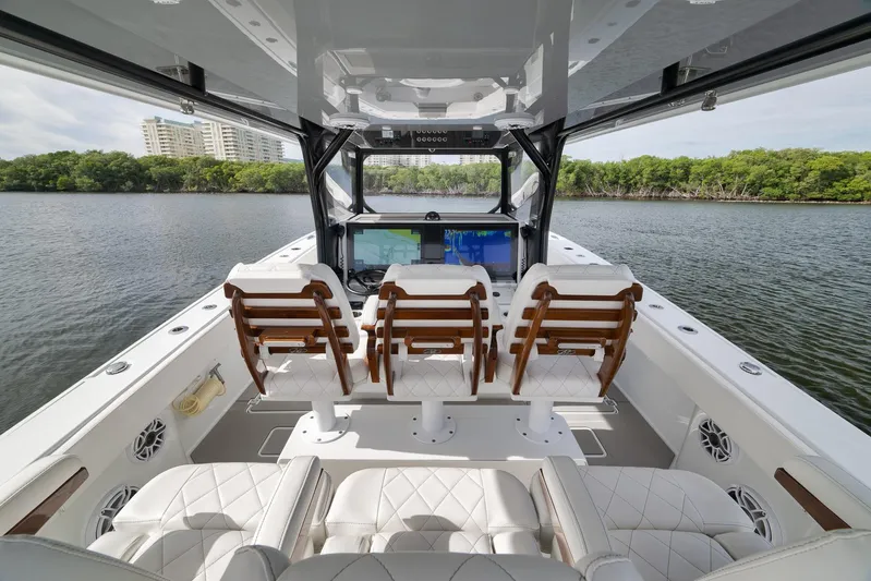  Yacht Photos Pics 2022 Freeman 42LR boat interior with luxurious seating and advanced navigation system.