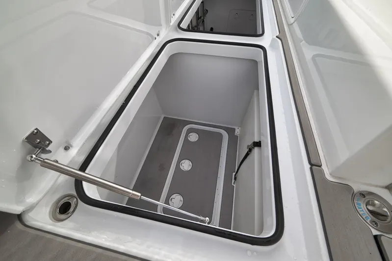  Yacht Photos Pics Spacious storage compartment in 2022 Freeman 42LR boat, featuring durable construction and secure latches.