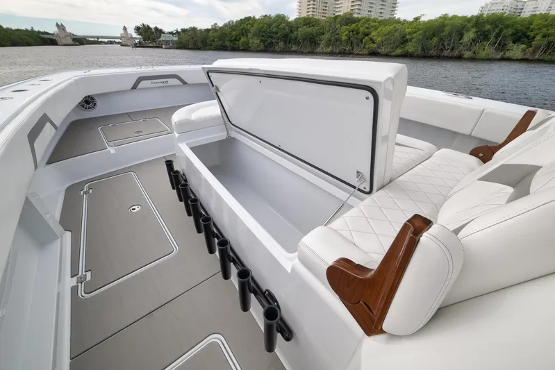  Yacht Photos Pics Luxurious 2022 Freeman 42LR boat interior with open storage and elegant seating.