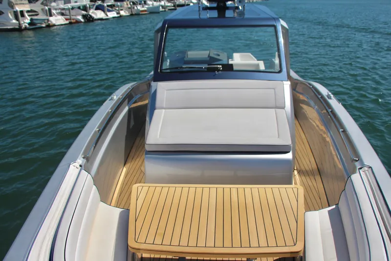  Yacht Photos Pics 2017 Maori 50 yacht with teak deck and luxurious seating, docked at marina.