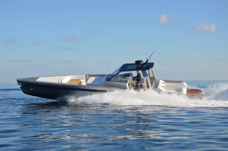  Yacht Photos Pics 2017 Maori 50 boat cruising on open water.