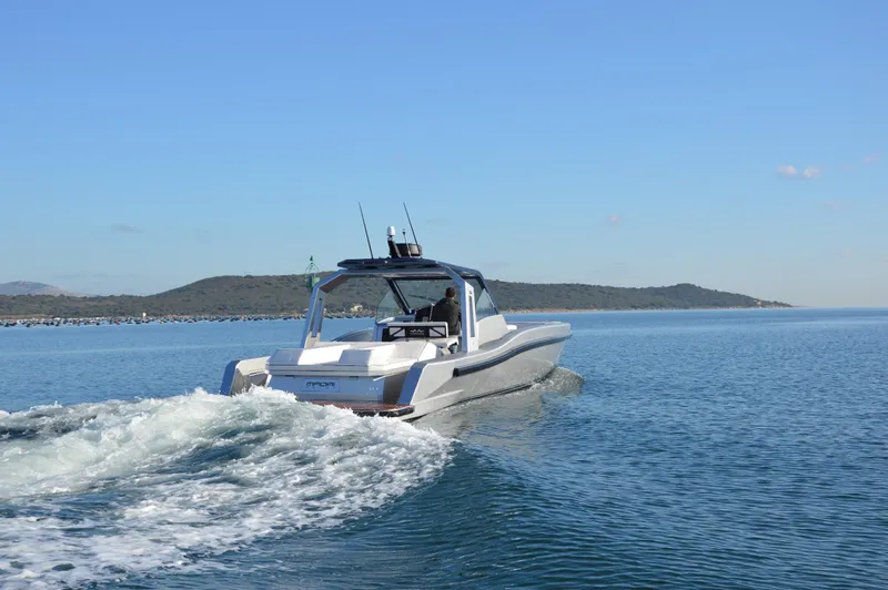  Yacht Photos Pics 2017 Maori 50 boat cruising on a calm sea.