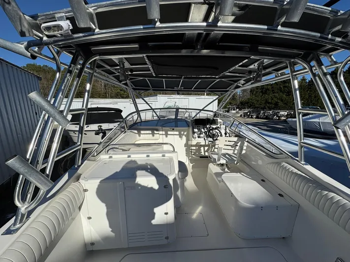  Yacht Photos Pics 2008 Fountain 38 Sportfish Express Cruiser interior with seating and control panel.