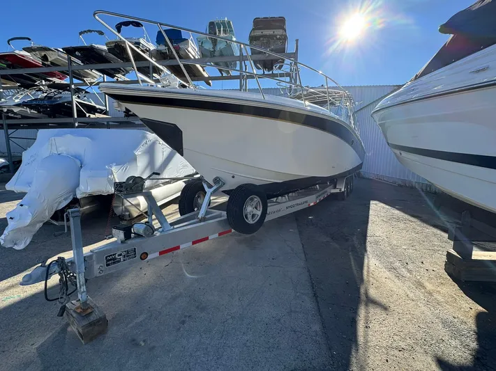  Yacht Photos Pics 2008 Fountain 38 Sportfish Express Cruiser on trailer in sunny boatyard.