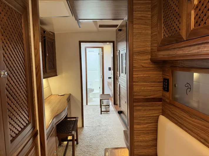 Alora Yacht Photos Pics Luxurious interior of 2023 Knysna 500 SE yacht with wooden cabinetry and modern amenities.