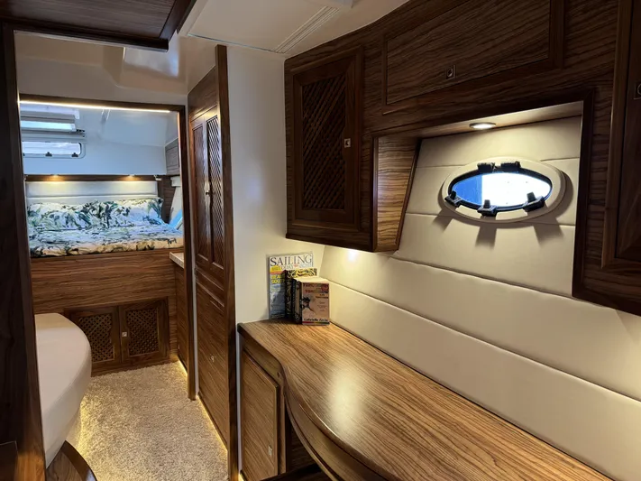 Alora Yacht Photos Pics Luxurious interior of 2023 Knysna 500 SE yacht with wood finish and cozy cabin.