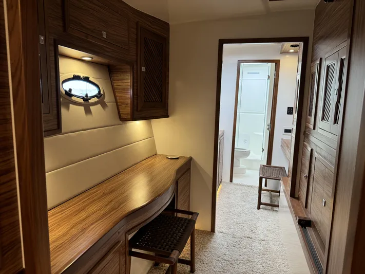 Alora Yacht Photos Pics Luxurious interior of 2023 Knysna 500 SE yacht with wood finish and modern amenities.