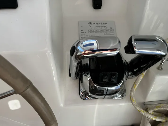 Alora Yacht Photos Pics Chrome throttle controls on a 2023 Knysna 500 SE yacht dashboard.