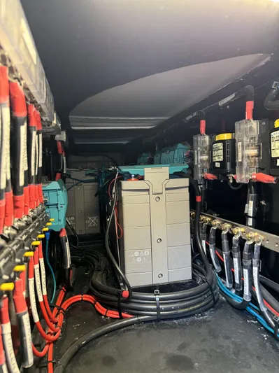 Alora Yacht Photos Pics Electrical system inside a 2023 Knysna 500 SE, featuring batteries and wiring components.