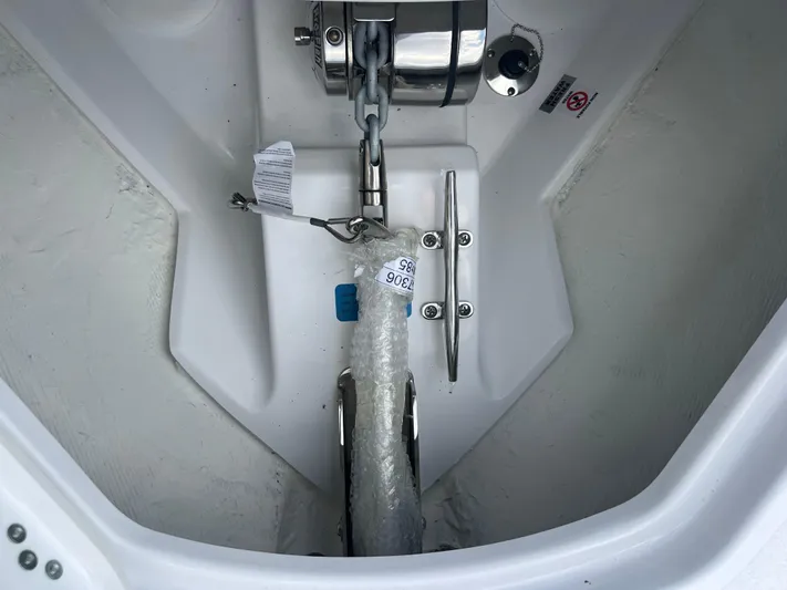  Yacht Photos Pics 2025 Sportsman Open 262 Center Console anchor compartment with chain and cleat.