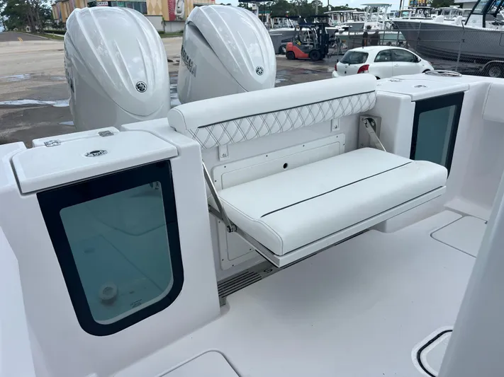  Yacht Photos Pics 2025 Sportsman Open 262 Center Console with dual engines and foldable rear seat.