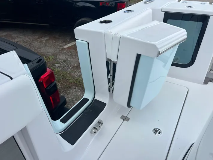  Yacht Photos Pics 2025 Sportsman Open 262 Center Console boat with sleek white interior and modern design.