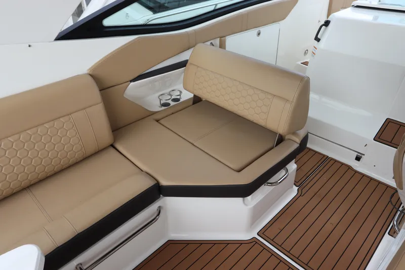  Yacht Photos Pics Luxurious seating area on 2019 Sea Ray Sundancer 320 boat with tan upholstery.
