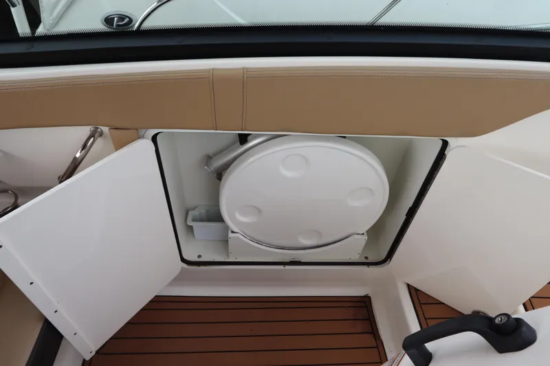  Yacht Photos Pics 2019 Sea Ray Sundancer 320 boat storage compartment with open hatch and teak flooring.