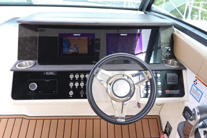  Yacht Photos Pics 2019 Sea Ray Sundancer 320 helm with dual displays and modern controls.