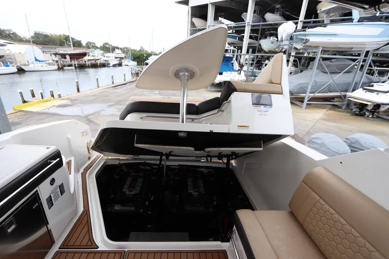 Yacht Photos Pics 2019 Sea Ray Sundancer 320 with open engine compartment at marina.