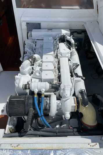 Bushwacker Yacht Photos Pics Engine of a 1972 Bertram 31 Sedan Hardtop Cruiser, detailed view.