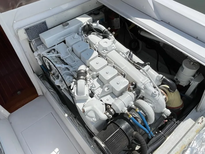 Bushwacker Yacht Photos Pics Engine of a 1972 Bertram 31 Sedan Hardtop Cruiser, showcasing detailed mechanical components.