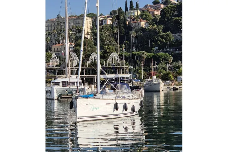 A Yacht Photos Pics Sailboat Dufour 425 Grand Large 2009 docked in scenic marina.