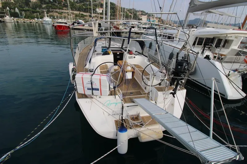 A Yacht Photos Pics 2009 Dufour 425 Grand Large yacht docked in marina, rear view.