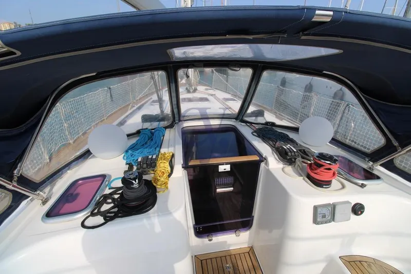 A Yacht Photos Pics Cockpit of 2009 Dufour 425 Grand Large sailboat with ropes and equipment.