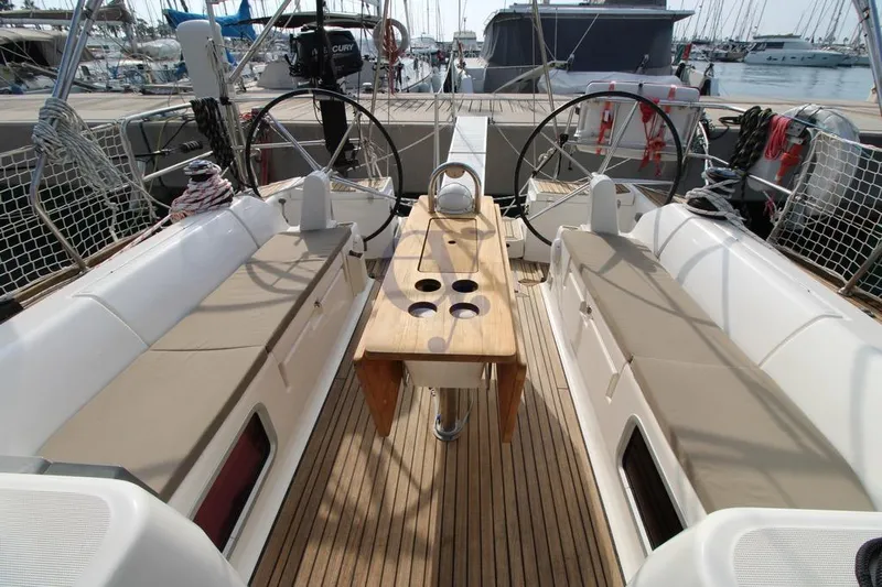 A Yacht Photos Pics 2009 Dufour 425 Grand Large yacht cockpit with dual steering wheels and teak deck.