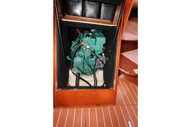 A Yacht Photos Pics Engine compartment of 2009 Dufour 425 Grand Large sailboat, showcasing marine engine.