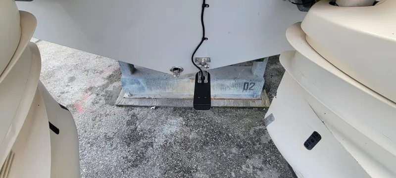  Yacht Photos Pics 2020 Cobia 320 Center Console boat on trailer, rear view with visible wiring.