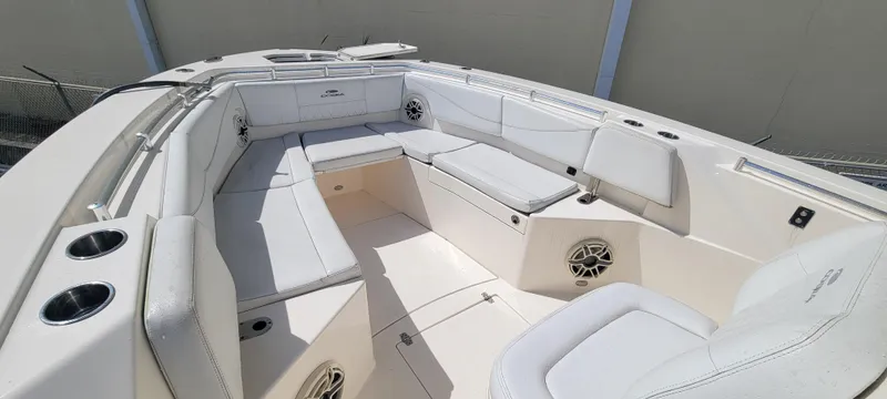  Yacht Photos Pics 2020 Cobia 320 Center Console boat interior with spacious seating and cup holders.