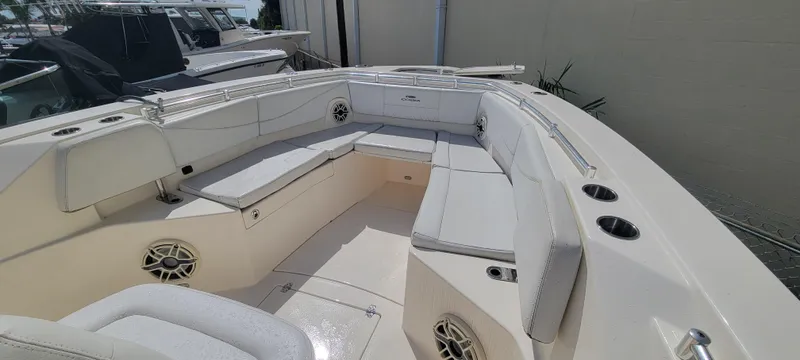  Yacht Photos Pics 2020 Cobia 320 Center Console boat with spacious seating and cup holders.