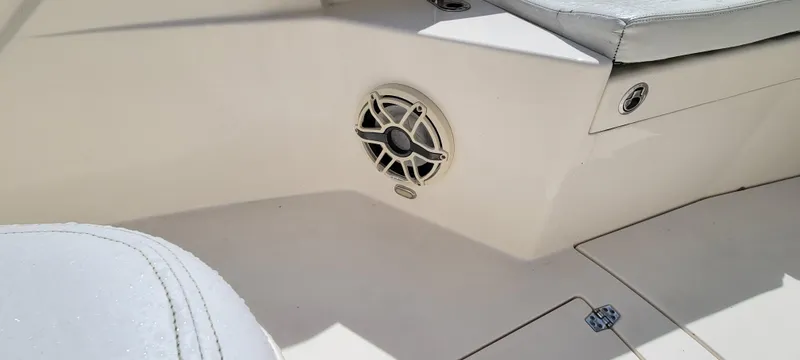  Yacht Photos Pics 2020 Cobia 320 Center Console interior with speaker and seating detail.