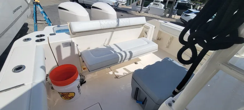  Yacht Photos Pics 2020 Cobia 320 Center Console boat interior with seating and equipment.