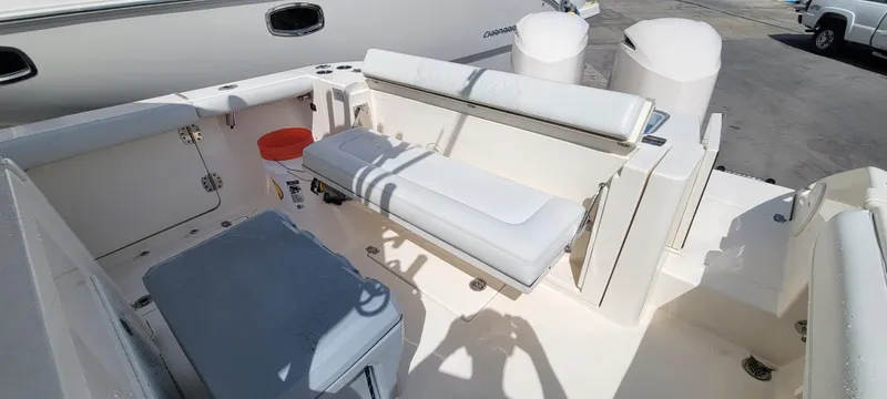  Yacht Photos Pics 2020 Cobia 320 Center Console boat interior with seating and storage.