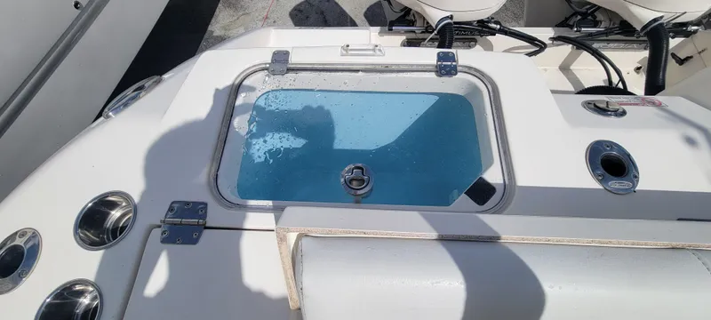  Yacht Photos Pics Livewell on 2020 Cobia 320 Center Console boat deck.