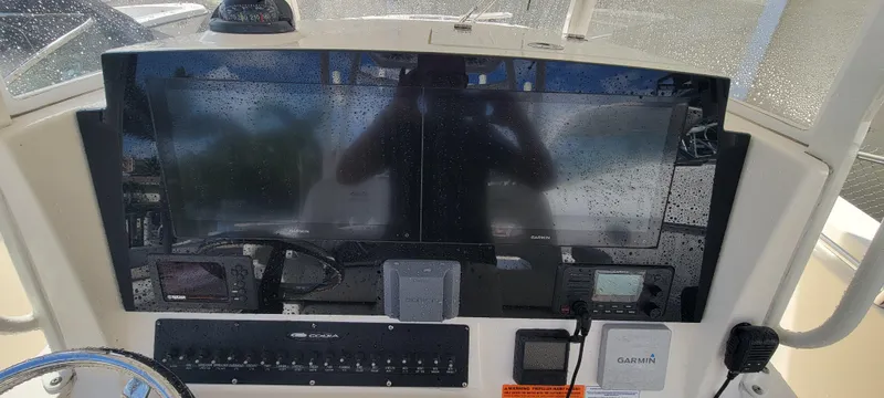  Yacht Photos Pics Dashboard of 2020 Cobia 320 Center Console with electronic displays and controls.