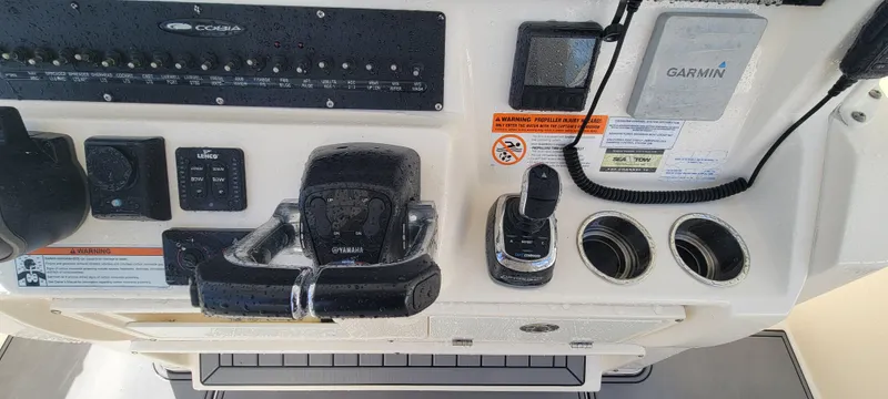  Yacht Photos Pics Control panel of 2020 Cobia 320 Center Console boat with Garmin equipment.