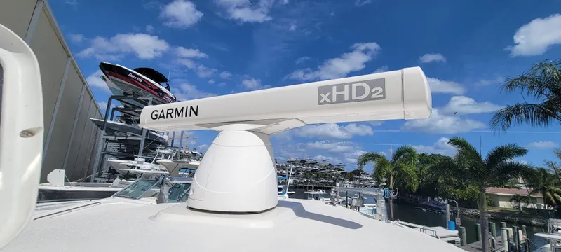  Yacht Photos Pics Garmin xHD2 radar on 2020 Cobia 320 Center Console boat under blue sky.
