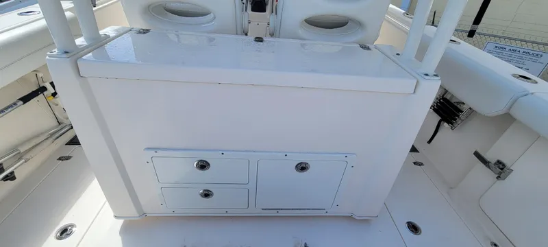  Yacht Photos Pics 2020 Cobia 320 Center Console boat interior with storage compartments.