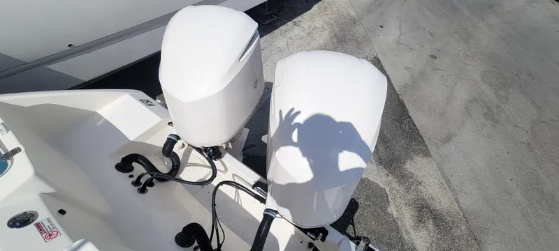  Yacht Photos Pics Twin outboard motors on a 2020 Cobia 320 Center Console boat.