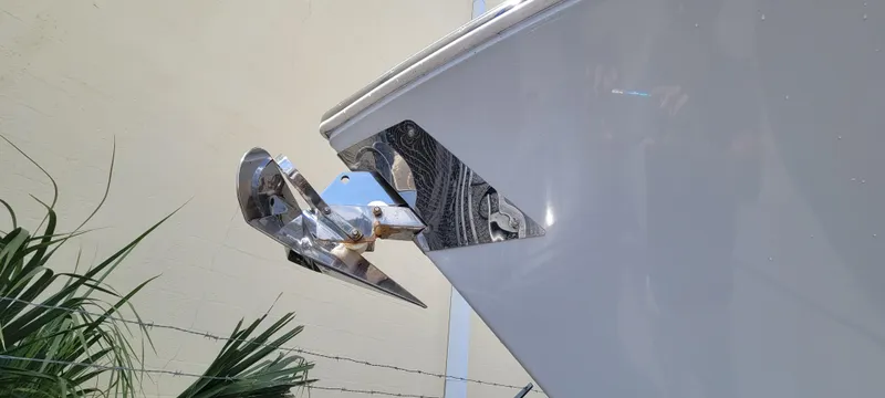  Yacht Photos Pics 2020 Cobia 320 Center Console boat anchor detail with sleek design.